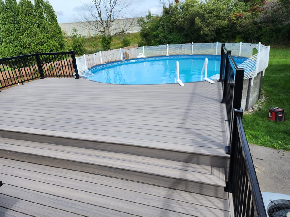 Exterior Service Deck around pool using trex decking - POIRIER RENOVATIONS